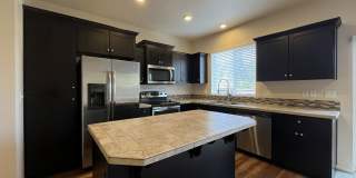 Stylish 3-Bedroom Bethany Residence with Open-Concept Living, Fenced Yard, and Attached Garage Gallery 6