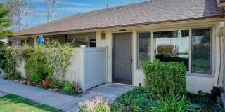 Must-see! This adorable 3-bedroom, 1.5-bathroom multi-level unit Gallery 1