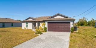 NOW AVAILABLE - 3/2 with 2 Car Garage in Mirror Lakes! Gallery 4