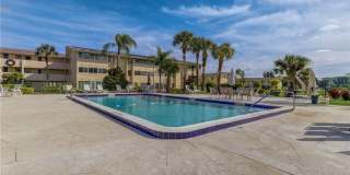 55+ Charming first-floor condo nestled in the serene Fairways 3 Condominiums Gallery 18