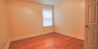 This 2 bedroom 1 bath home has been completely refinished with brilliant hardwood floors throughout! Gallery 16