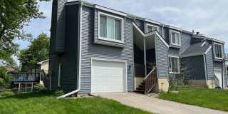 2 BR, 1.5 BA Clive split level duplex.  Deck and one car attached garage. Gallery 1