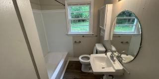 2BR 1BA with fenced in backyard with free 1st month rent! Gallery 5