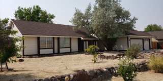 ONLY $2,850 PER MONTH FOR THIS SPACIOUS RANCH STYLE HOME -  2056 SQ FT / 3BDRM/2BATH/3GARAGE ON OVER ONE ACRE LOT IN SPANISH SPRINGS - NEW CARPET THROUGHOUT Gallery 1