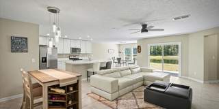 Beautiful Open Layout 4 Bed, 3 Full Bath | A True Masterpiece Backing to a Peaceful Pond with Modern Upgrades + Tesla Charging Gallery 21