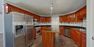 Charming 3-Bedroom Home with Brand New Windows, Garden Yard and Coffee Bar in Navarre Gallery 6
