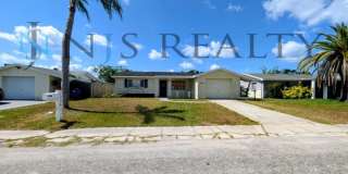 Gorgeous 3/2/1 1200 Sq. Ft. with fenced yard, all tile floors, custom baths and remodeled kitchen!! Gallery 1