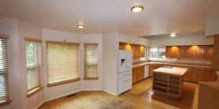 $500 move-in special_Spacious Country Club Home | 3-Car Garage + Basement Bonus Area Gallery 12