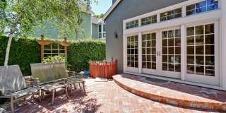 Stunning two-story spacious home on tranquil tree-lined street. Gallery 59