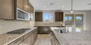 Gated community Located within the Valley Vista Master Plan. 4 Bed 3 Bath features and Open and inviting floor plan. Gallery 17