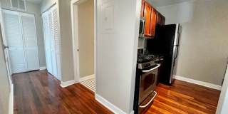 MOVE IN NOW!! Gated community Miriada! 1st floor 1X1.5 bath condo near pool area!!! Laminate wood flooring in living area and carpet in bedroom! Has washer & dryer! Gas stove & water heater! Gallery 15