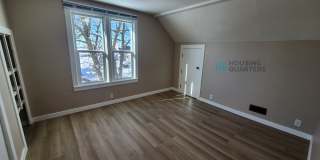 This 3-bed, 1-bath home features original woodwork, a covered front porch, a fenced yard, and an oversized detached garage! Gallery 15