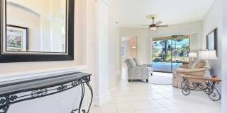 Lakefront 3 Bed + Den 2 bath home with pool and spa tub in Waterways of Naples Community Gallery 4