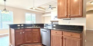 Spacious 4BR Home with Solar Panels, Downstairs Primary & Fenced Yard Gallery 14