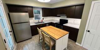 AVAILABLE NOW! Spacious 4 BR, 2 Bath House! Wood Floors, Attached Garage, W/D Included Gallery 17