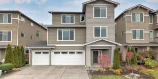 Brightview 4‑Bedroom with Main‑Floor Bedroom, 3‑Car Garage, and Exceptional Outdoor Space Gallery 1