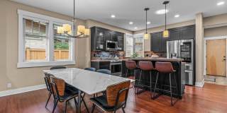 Grand Northwest Crossing Home. Fully furnished monthly rental. Walk to Compass Park. All Utilities, WIFI, and Landscaping Included in Rent. Gallery 12