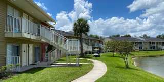 1/1 in the Heart of Brandon with a lake view! Gallery 1
