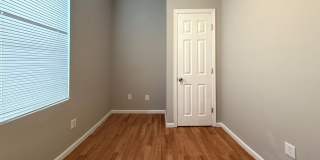 Charming 4BR/2BA Rowhouse with Hardwood-Style Flooring Throughout Gallery 15