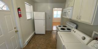 Private carport, in-unit laundry, and the Lakewood strip right outside your door. Gallery 6