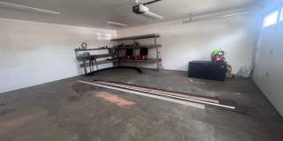 2 Bedroom 1 bath house with extra large double car garage and extra storage space! Gallery 25