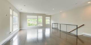 Stunning South End end unit townhome in the modern and amazing Southpoint community. Gallery 21