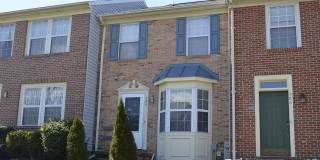 Updated 3-Bedroom Townhome with Finished Walkout Basement, Fenced Yard & Deck Gallery 1