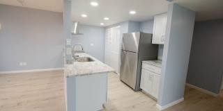 Updated 2BR Condo Steps from Mayo + Underground Parking Updated 2BR Condo Steps from Mayo + Underground Parking Gallery 1