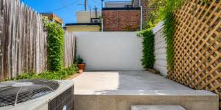 Charming Baltimore Rowhome with Exposed Brick & Private Patio Gallery 24