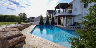 4 Bedroom, 4 Bath Home w/Backyard Heated Pool overlooking Pearl's Fen Gallery 1