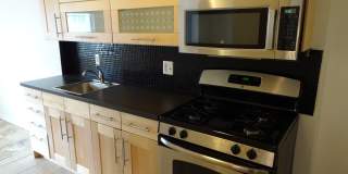 3 Bedroom 1.5 Bath Townhouse  w/ parking at the NOMA Metro Station Gallery 1
