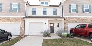 Like new modern maintenance free 3 bedroom 2.5 bath townhouse in Greensboro. Lawn care included. Gallery 1