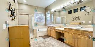 Open Kitchen, Expansive Living, and Covered Patio in Tranquil South Reno Near Trails, Parks & Shopping Gallery 40