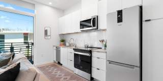 Modern downtown condo studio with private balcony & parking space. Gallery 5