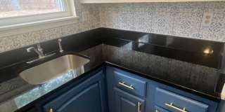 LOVELY CAPE COD WITH 4 BEDS, 2 BATHS AND GARAGE Gallery 12