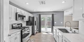 Stunning 3-Bedroom Townhome with Spacious Backyard & Fireplace Gallery 1