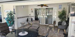 Welcome to this fully furnished vacation or corporate  3 bedroom 2 baths with solar heated pool home Gallery 21