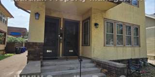 Large main floor duplex unit, Updated Kitchen & Bath, Full Dining Room w/Built-ins + Sunroom, garage stall Gallery 16