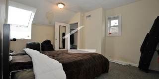 Huge Townhouse near T w Laundry in Unit!  30 Foot Ceilings in Living Room! Gallery 15
