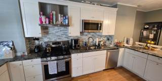 Spacious Three-Level Boston Rental with Flexible Living Space Gallery 1