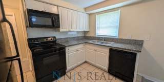 Newly renovated 3/1/1 NEW flooring, NEW paint, updated kitchen & bath, fenced yard.. a MUST SEE!! Gallery 6