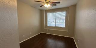 Single-level 3-bedroom home in a desirable Chandler location featuring a 2-car garage and tile roof and wood plank flooring throughout Gallery 32