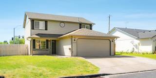 $500 move-in special! Spacious 4-bdrm/2.5-bath Hillsboro home. Fenced yard w/ covered deck, 2-car garage, great location Gallery 1