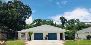 Experience this Cape Coral 3 bedroom 2 bath duplex with 1 car garage and screened in lanai. Gallery 1