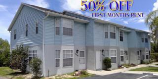 Large 2 bed 1 1/2 bath Town house. Inside laundry, assigned parking Gallery 1