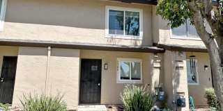 Move-in ready Evergreen townhome with private backyard, detached 2-car garage, and great community amenities Gallery 1