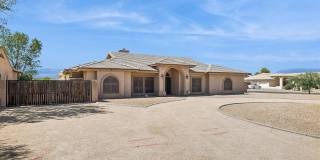 Furnished Basement home ready for move in NOW!!!  Corner lot, No HOA, lots of parking!!!  RV gates!!!  Luxurious backyard with pool and is your own Oasis in the City just out of the City!!!  Close to Lake Pleasant!!! Gallery 3