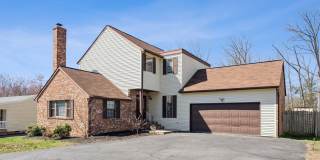 Beautifully renovated end-unit home on nearly an acre! Gallery 1