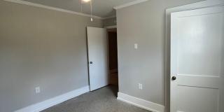 Travelers Rest !! 3 BR, 2 BA with Great Living Space - Den, Bonus Room, Primary Suite has a HUGE walk in Closet, Laundry Room, private screened in porch & deck AND a storage shed out back.  Fresh Paint and New LVP Floors Gallery 19