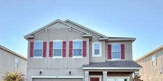 Stunning 4/2.5 in Highly Sought After Waterside Community! Gallery 1